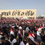 Bağdat'ta binlerce kişi İran'a destek için sokağa çıktı